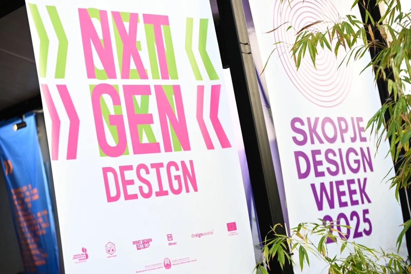 Next Gen Design poster next to Skopje Design Week signage.